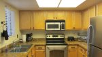 Kitchen w/ stainless steel appliances and granite counters 